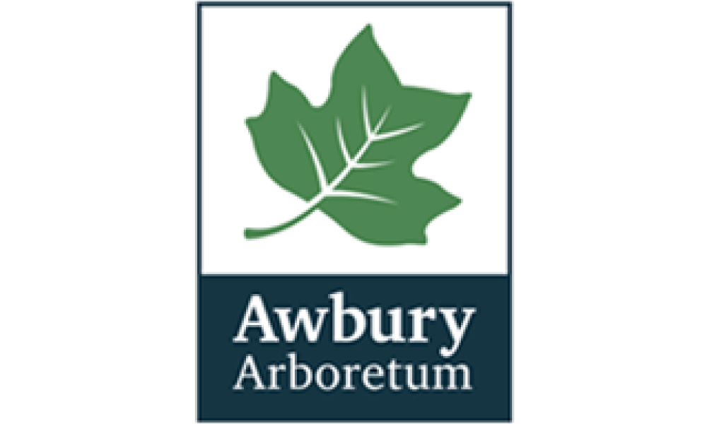 Awbury Arboretum Logo in white font under the outline of a leaf
